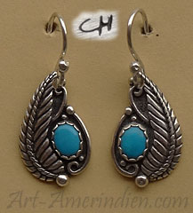 Boucles d'oreilles Navajo en argent ornées de turquoise, plumes et symboles amérindiens