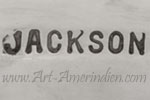 JACKSON mark in capitals on native american jewelry is Tommy Jackson Navajoletters