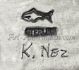 K Nez and fish hallmark on jewelry