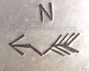 N over a broken arrow mark
