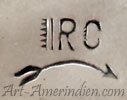 RC and curved arrow mark on Navajo jewelry