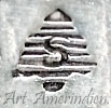 S inside an arrowhead mark