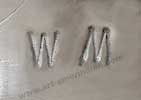 WM Hallmark with 2 W upside down for Willie Mariano, Navajo silversmith